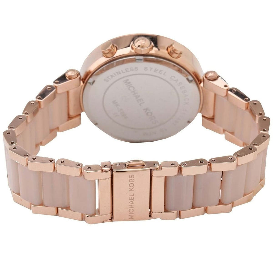 Front view of Michael Kors MK5896 women's rose gold watch with seamless dial