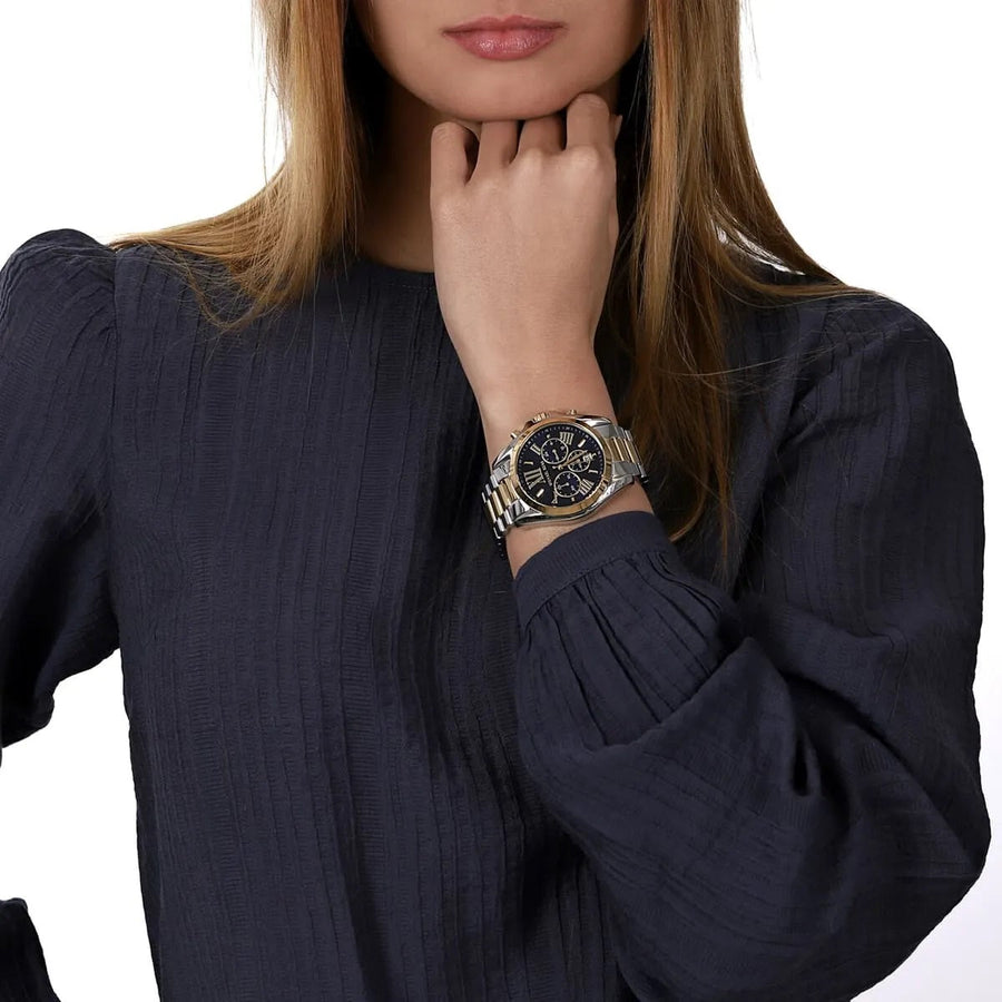 Front view of Michael Kors MK5976 with rich blue dial and gold-silver stainless steel strap