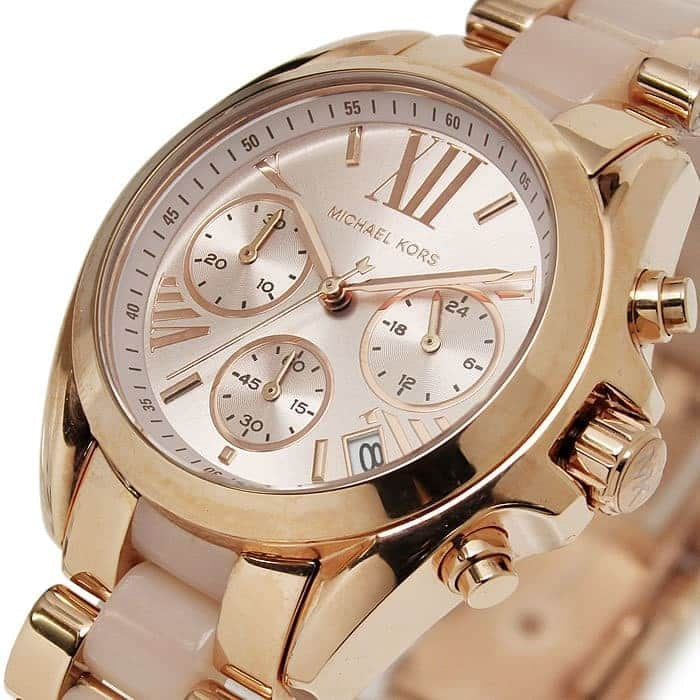 Front view of Michael Kors MK6066 women's rose gold-tone watch with sleek dial