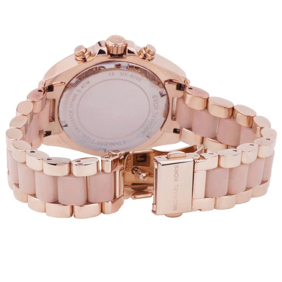 Front view of Michael Kors MK6066 women's rose gold-tone watch with sleek dial