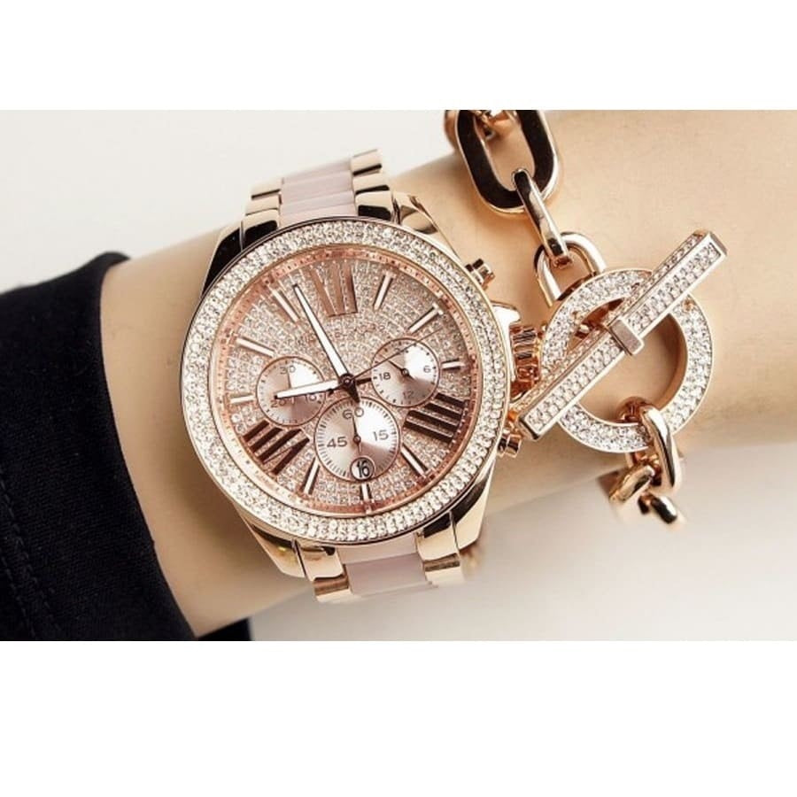 Front view of Michael Kors MK6096 women's rose gold watch with sparkling crystal dial