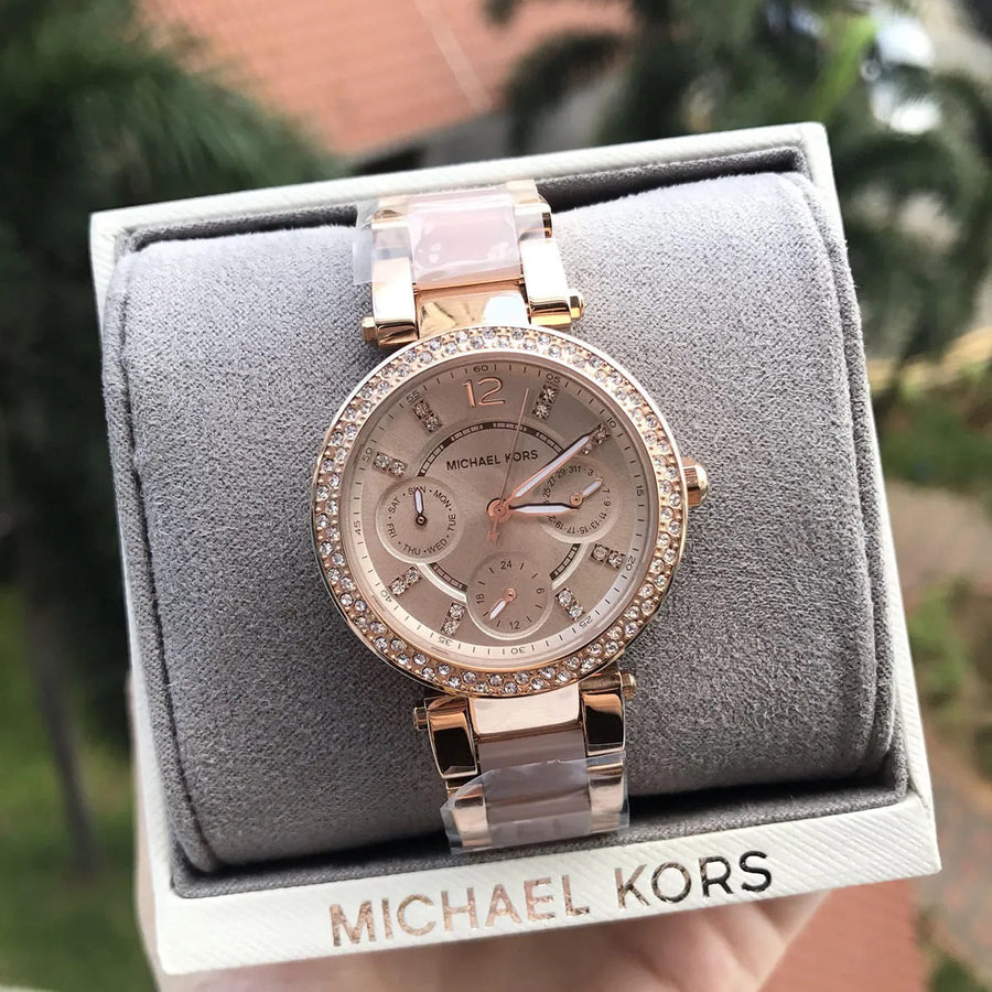 Front view of Michael Kors MK6110 women's rose gold-tone watch with matching dial