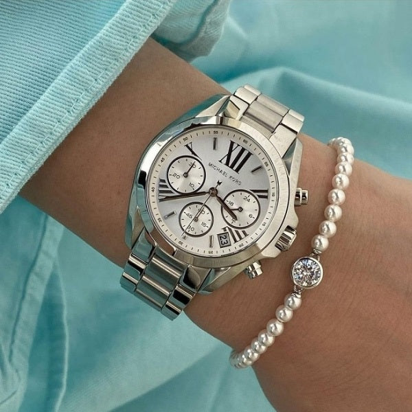 Front view of Michael Kors MK6174 women's silver watch with tone-on-tone silver dial