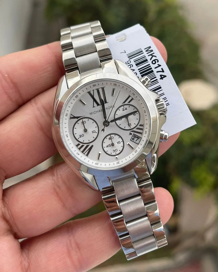 Front view of Michael Kors MK6174 women's silver watch with tone-on-tone silver dial