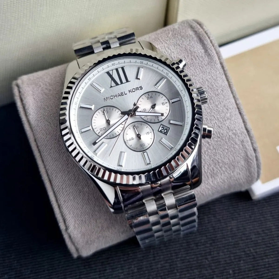 Front view of Michael Kors MK8405 men's silver watch with silver dial and stainless steel strap