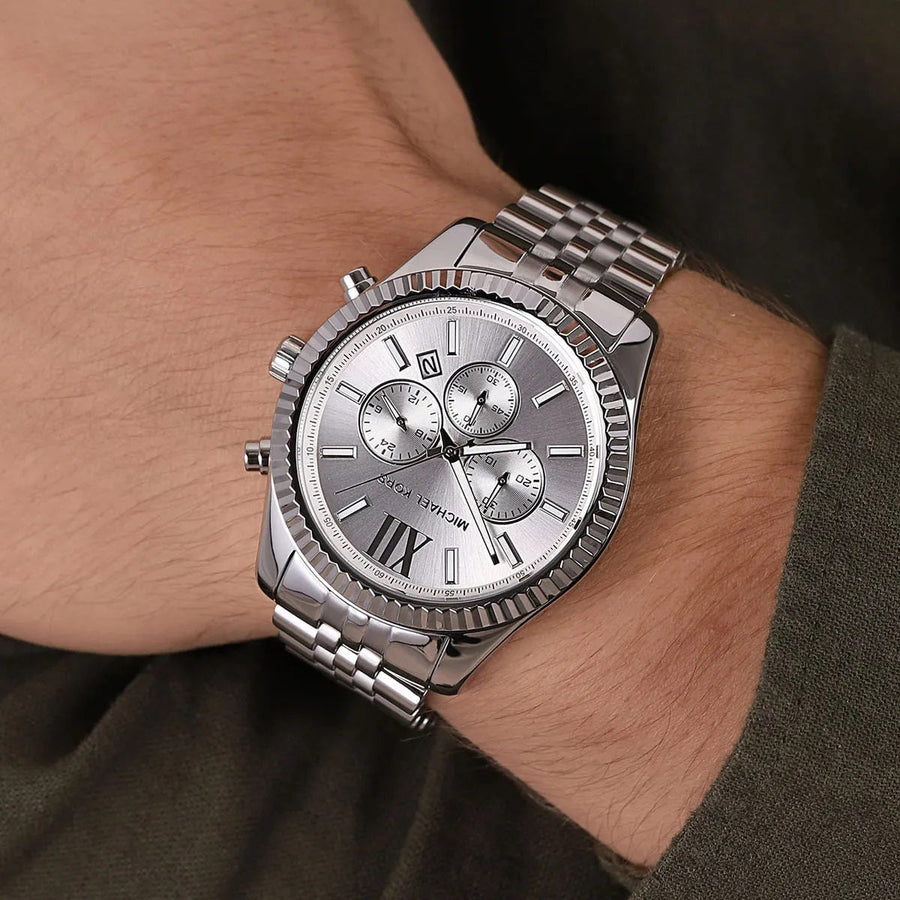 Front view of Michael Kors MK8405 men's silver watch with silver dial and stainless steel strap