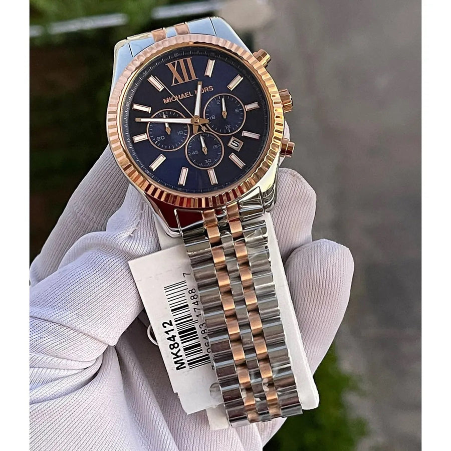 Front view of Michael Kors MK8412 men's watch with blue dial and two-tone silver-rose gold strap