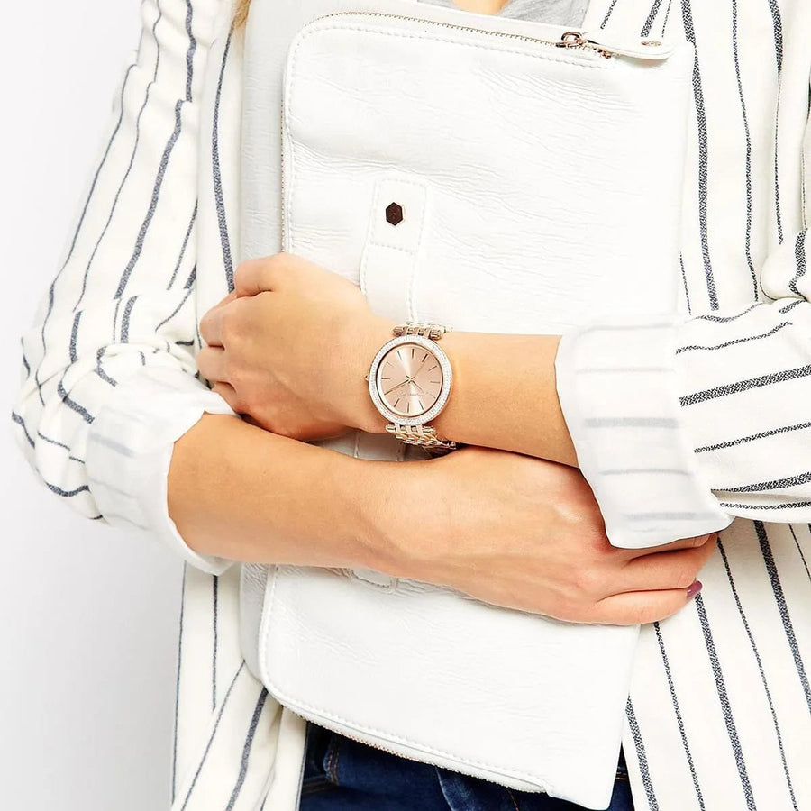 Front view of Michael Kors MK3192 women's watch with rose gold strap, rose gold dial, and crystals