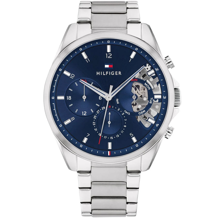 Tommy Hilfiger watch with blue dial and silver metal strap on a white background
