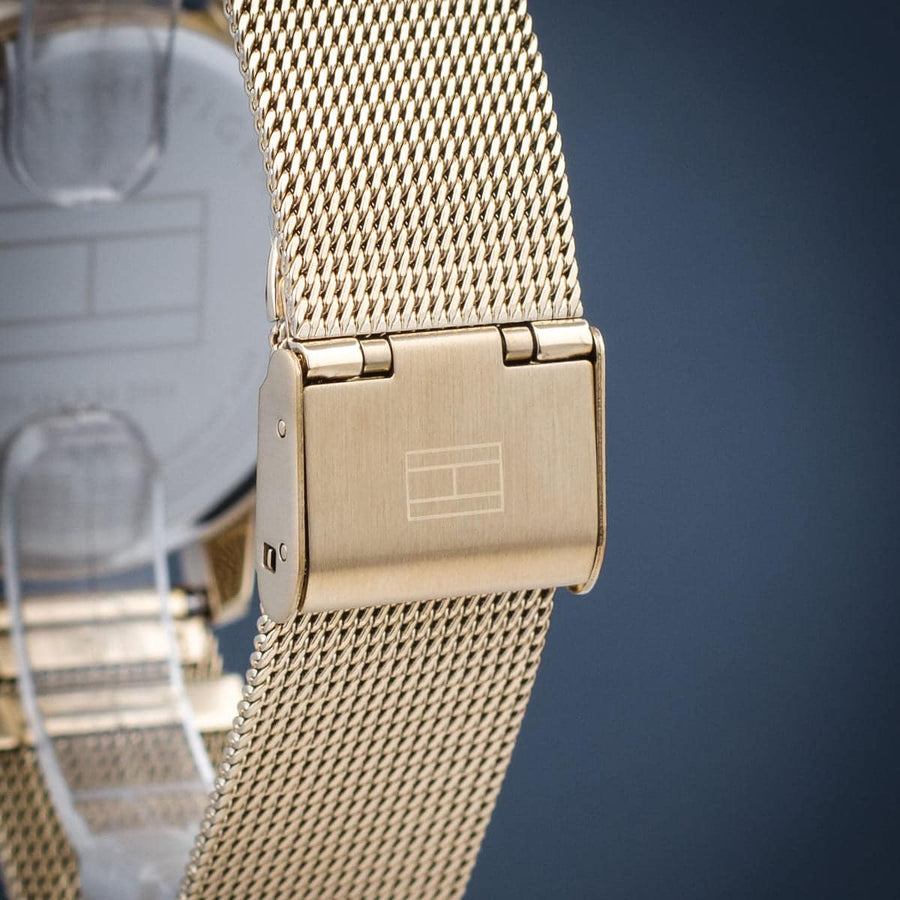 Front view of Tommy Hilfiger 1782302 women’s gold mesh strap watch with gold dial