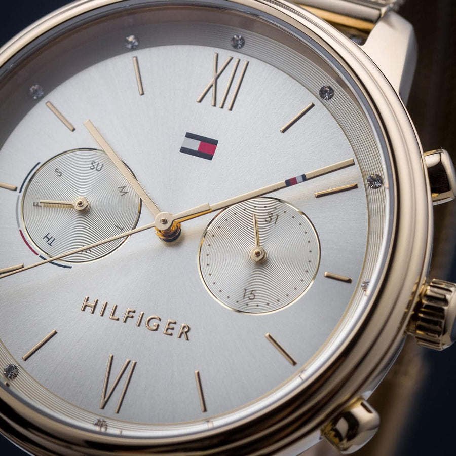 Front view of Tommy Hilfiger 1782302 women’s gold mesh strap watch with gold dial