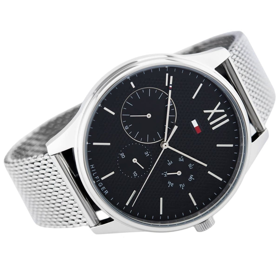 Close-up of black dial on Tommy Hilfiger 1791415 men's watch with minimalist design