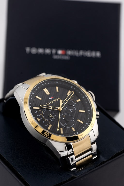 Front view of Tommy Hilfiger 1791559 men's two-tone watch with black dial